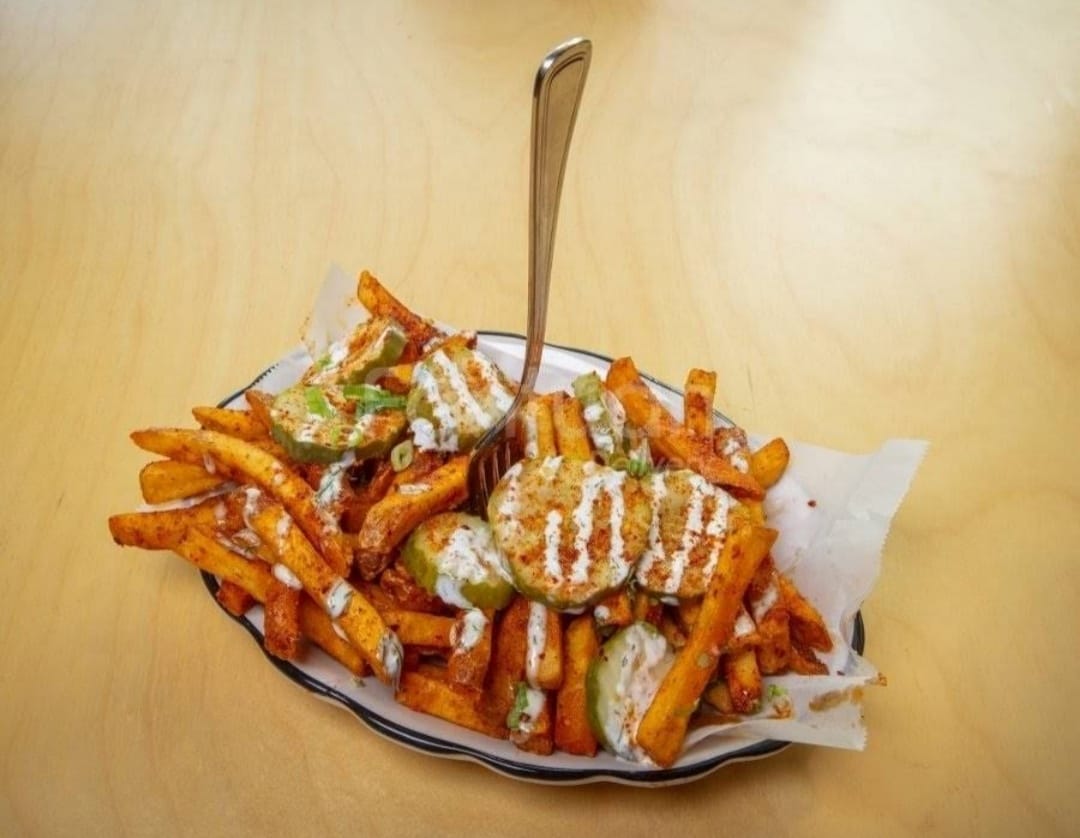 Seasoned Fries with Pickles and Sauce